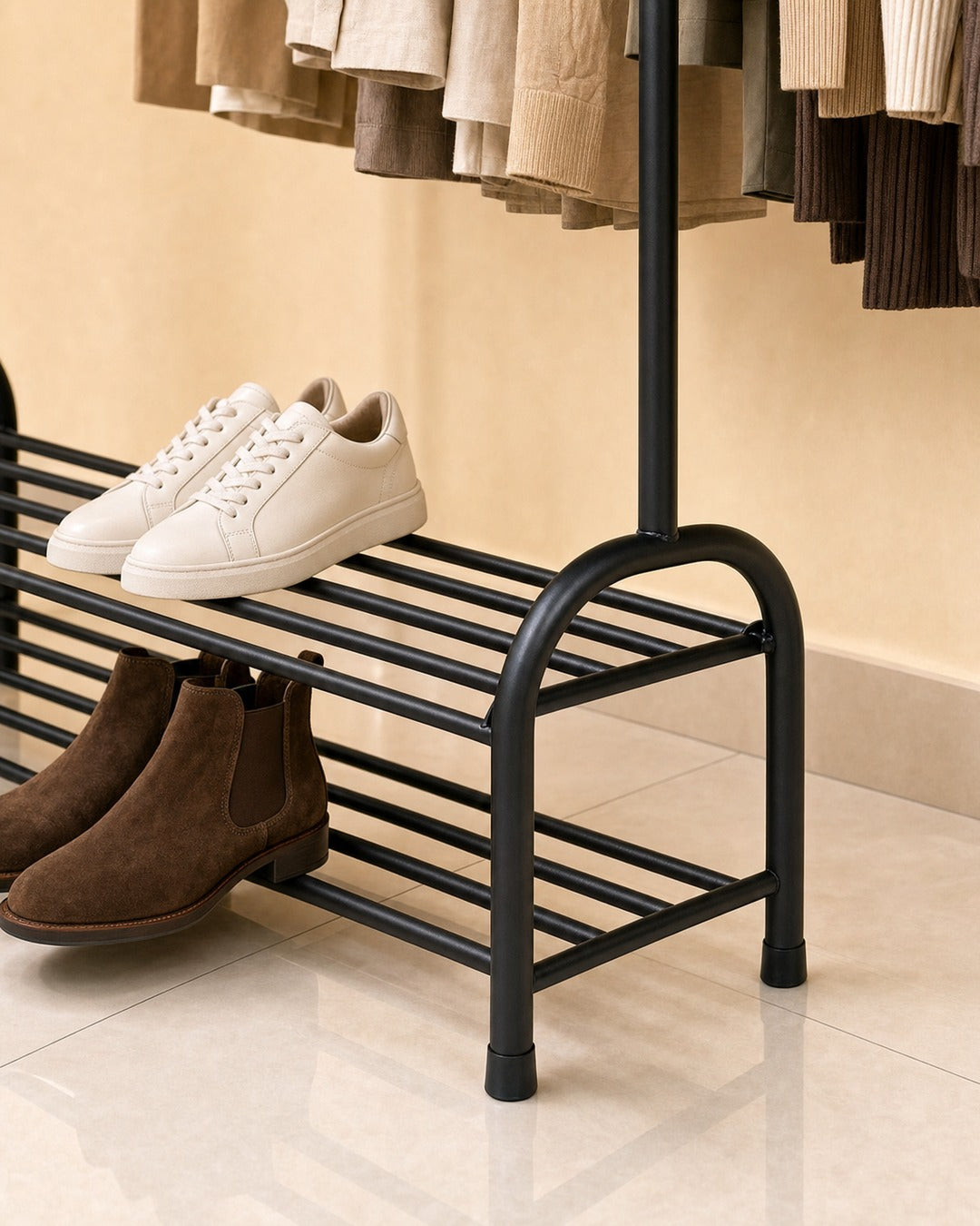 Clothing Stand with 2 Shoe Racks & 2 Bag Holders - close-up of the arched end frame and rubber feet, in a living room