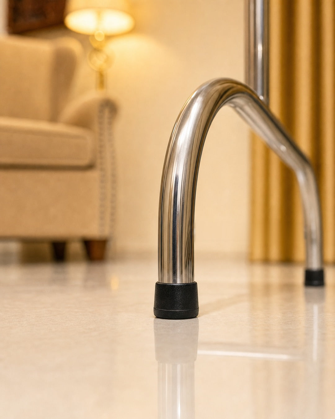 Straight Clothing Stand - close-up: rubber tip, in a living room